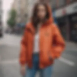 A stylish woman wearing a modern windbreaker coat in an urban setting