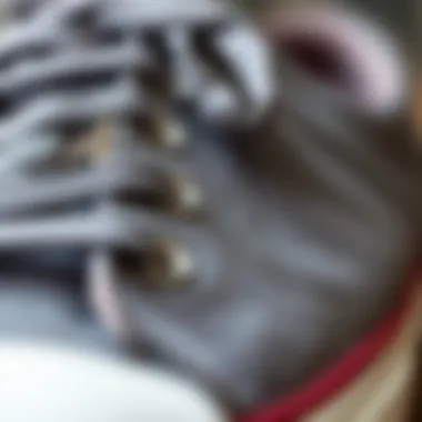 Textured Elegance of Grey Converse Design Close-up shot of the fabric texture of grey Converse sneakers