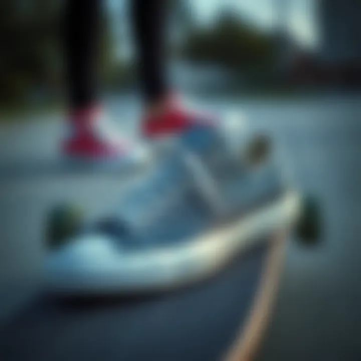 Grey Converse Sneakers and Skateboarding Culture A stylish pair of grey Converse sneakers resting on a skateboard