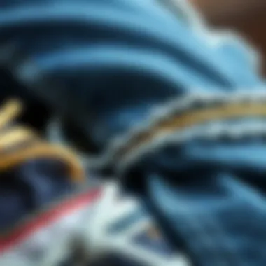 Diverse Textures of Denim A close-up of various fabric textures used in ripped jeans