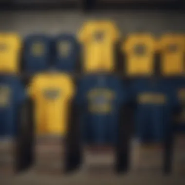 A collection of navy blue and yellow graphic tees displayed creatively