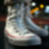 Close-up of all white Chuck Taylor high-tops showcasing their classic design