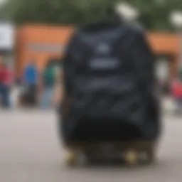 Stylish black JanSport bag on a skateboard