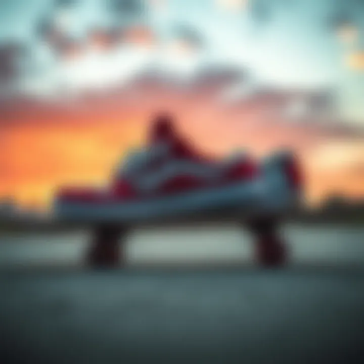 Red skate shoes resting on a skateboard with a sunset backdrop