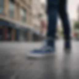 Navy blue Vans sneakers showcased in an urban setting