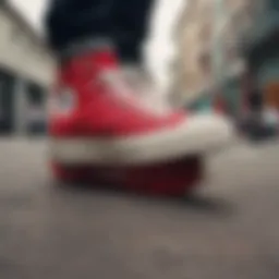 Close-up of red platform Converse low tops showcasing unique design elements