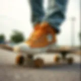 Tan Converse shoes on a skateboard