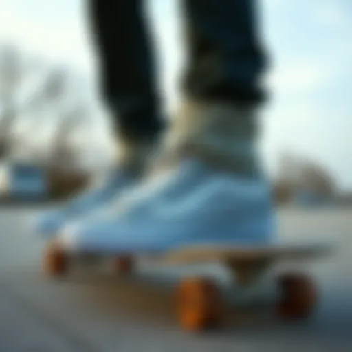 Light Gray Vans High Tops in Action Light gray Vans high tops on a skateboard