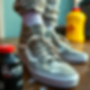 Light gray Vans high tops being cleaned and maintained