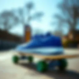 Stylish royal blue Adidas sneakers displayed on a skateboard