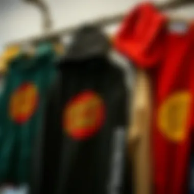 A collection of various Santa Cruz hoodies on display
