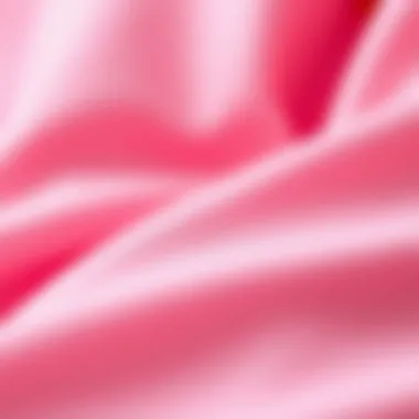 A close-up of pink fabric textures, highlighting the aesthetic appeal of skateboarding apparel.