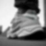 Stylish view of Fila Disruptor 2 in black and white