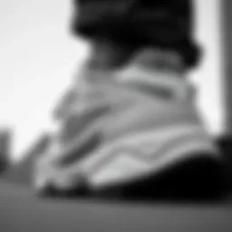 Stylish view of Fila Disruptor 2 in black and white