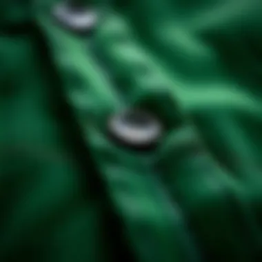 Close-up of green corduroy texture highlighting its unique fabric weave.