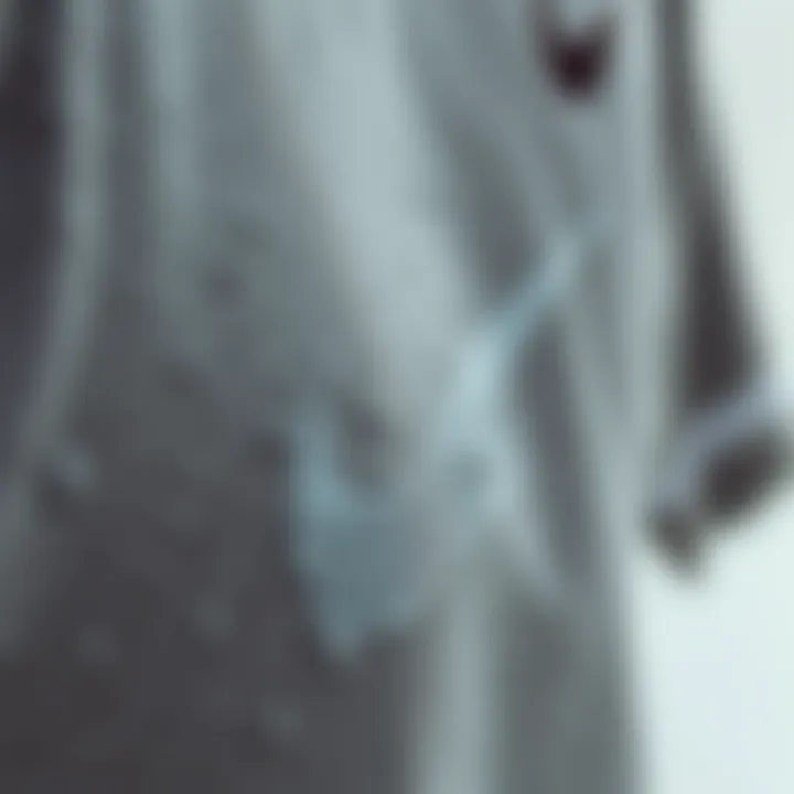 Close-up of the fabric texture of a grey Nike crew neck garment