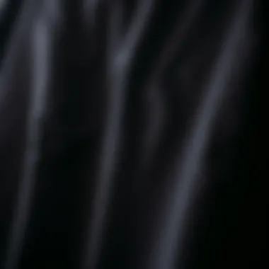 Quality Fabric of the Oversized Black Tee Close-up of fabric texture showcasing the quality and comfort of an oversized black tee shirt.