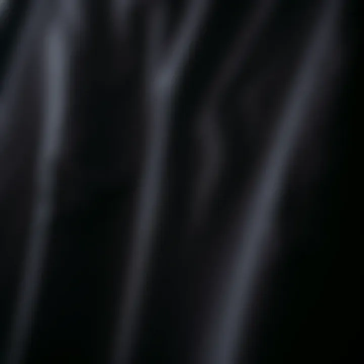 Quality Fabric of the Oversized Black Tee Close-up of fabric texture showcasing the quality and comfort of an oversized black tee shirt.