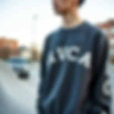 Stylish individual wearing an RVCA sweatshirt in an urban skate park setting