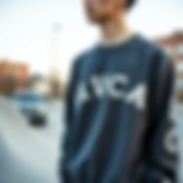 Stylish individual wearing an RVCA sweatshirt in an urban skate park setting