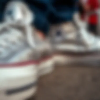 Close-up of silver Converse shoes showcasing unique textures