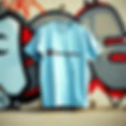 Light blue Champion shirt displayed against a graffiti wall