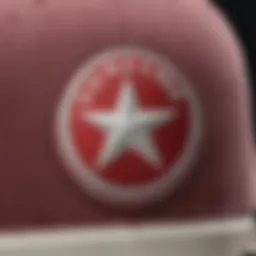 A close-up of the distinct design of a Converse hat showcasing its logo and stitching.