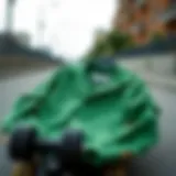 A vibrant green corduroy button-up shirt displayed on a skateboard.