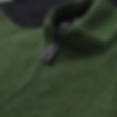 Material Matters: Exploring the Texture of the Pullover Close-up of the green quarter zip pullover highlighting its material and texture
