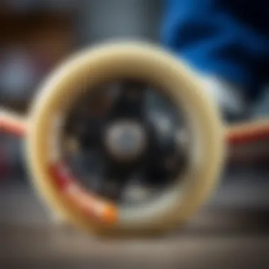 A close-up view of a skateboard wheel before and after sharpening