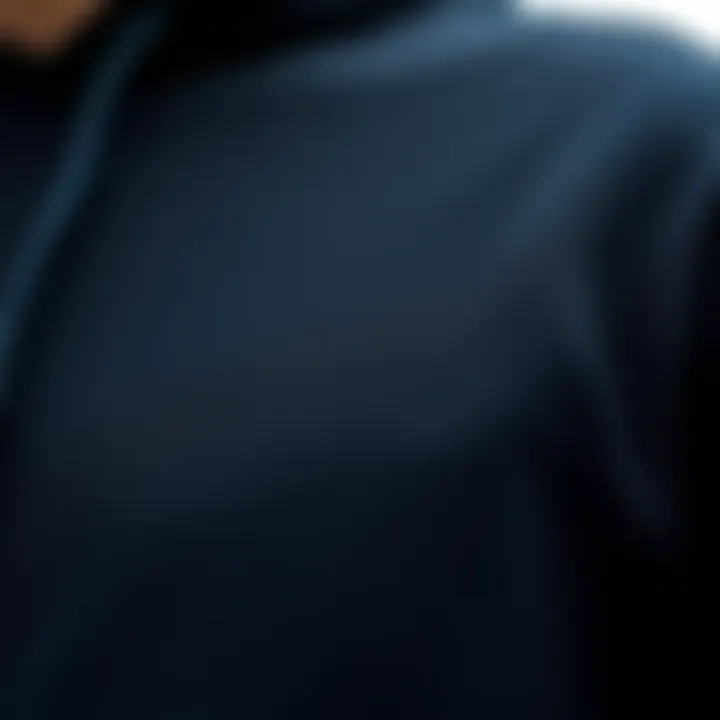 Fabric Texture of the Black Hoodie A close-up of a black hoodie shirt showcasing its fabric texture
